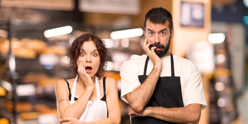 Couple,of,cooks,surprised,and,shocked,while,looking,right