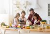 Happy,family,cooking,together,on,kitchen.,mother,and,daughter,reading