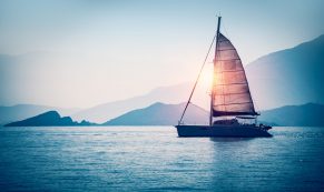 Sailboat,in,the,sea,in,the,evening,sunlight,over,beautiful