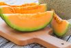 Fresh,melons,sliced,on,wooden,table