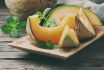 Fresh,sweet,orange,melon,on,the,wooden,table,,selective,focus