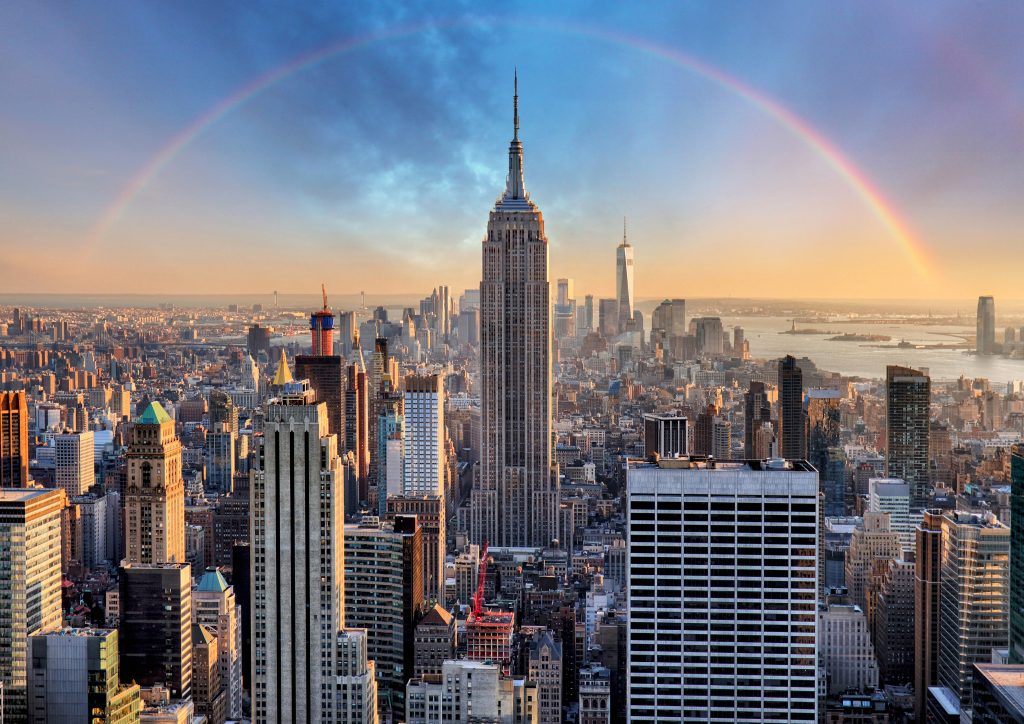 New,york,city,skyline,with,urban,skyscrapers,and,rainbow.