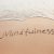 Mindfulness,concept,,mindful,living,,text,written,on,the,sand,of