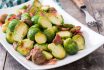 Brussels,sprouts,with,chestnuts,and,bacon,on,wooden,table