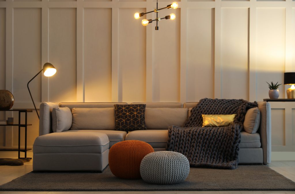 Living,room,interior,with,different,stylish,knitted,poufs,and,sofa