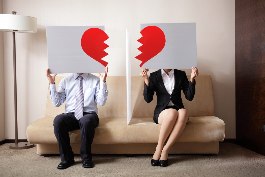 Divorce, ,sad,young,couple,holding,billboard,sign,with,break