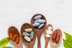 Variety,of,vitamin,pills,in,wooden,spoon,on,white,background