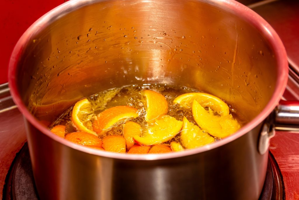 Insisting,of,tangerine,jam,(varenye),in,sugar,syrup,in,stewpot