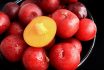 Ripe,plums,,fresh,red,plums,on,dark,tone.,background,of