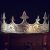Low,key,image,of,beautiful,queen/king,crown,over,wooden,table.