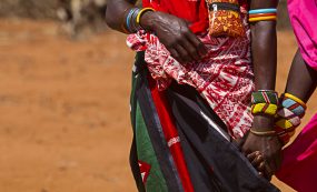 Samburu,women,holding,hands,in,tribal,attire
