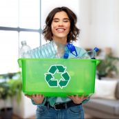 Recycling,,waste,sorting,and,sustainability,concept, ,smiling,young,woman