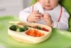 Little Baby Eating Food In High Chair, Closeup