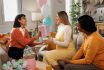 Young Beautiful Pregnant Woman Getting Presents On A Baby Shower Party At Her Apartment