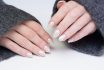 Attractive Manicure On Women's Hands. Natural Finger Nails With Stylish Nail Art.
