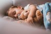 Baby Boy Sleeping With Teddy Bear And Pacifier