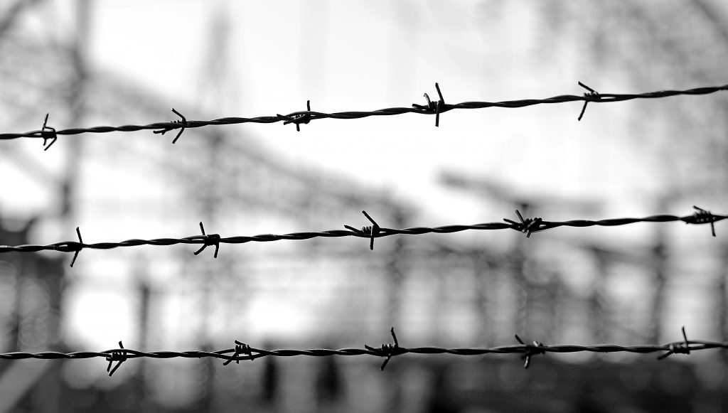 Three Lines Of Barbed Wire To Demarcate The Border