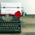 Vintage Typewriter With Paper Page And Rose Flower