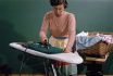 Woman Ironing At Home