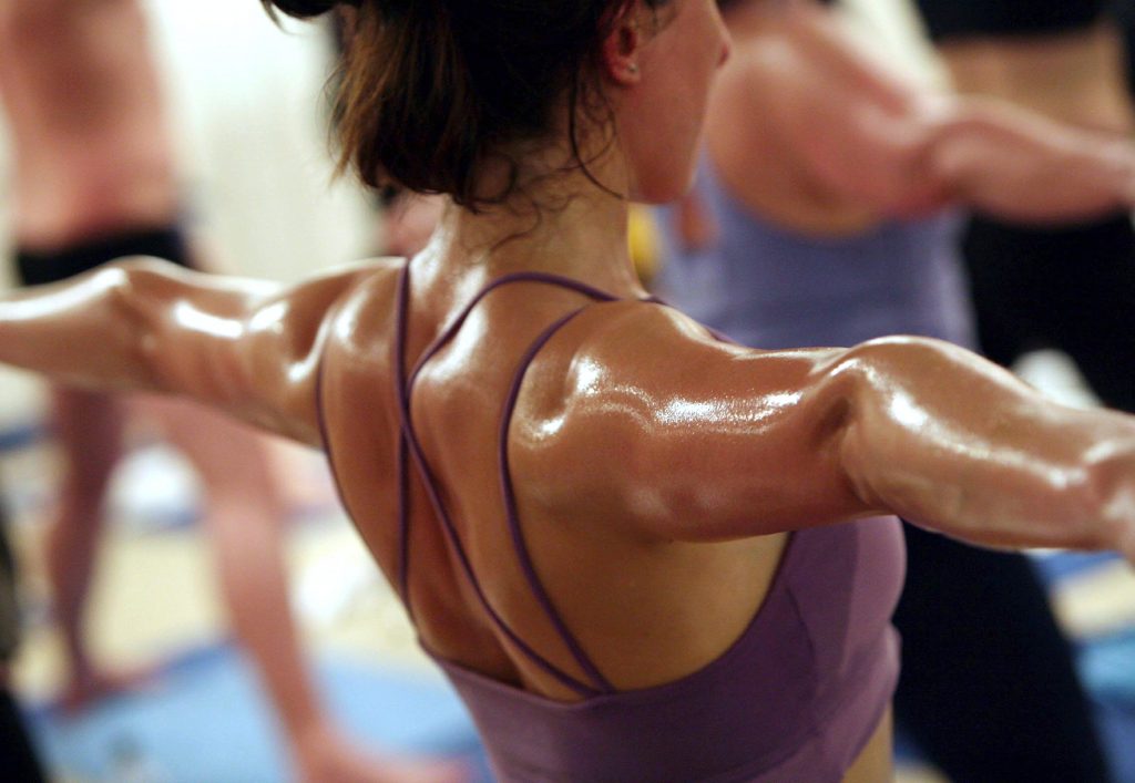 Students Practice The Unique Bikram Yoga