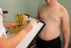 Friendly Nutritionist Measures Waist. Childhood Obesity, Weight Loss.