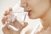 Young Woman Drinking Glass Of Water