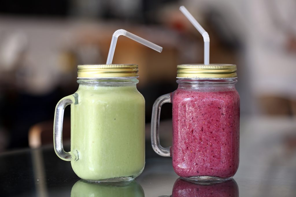 This Image Show Two Smoothies, Wheatgrass And Pineapple (l) And Berry Licious Smoothie At Classified Restaurant At The Pulse. 15may15 [2015 Features 48hrs]