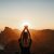 Young Woman In Spiritual Pose Holding The Light