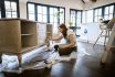 Young Woman Repairing An Old Furniture And Enjoying At Home