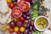 Healthy Snack Of Olives, Tomatoes, Olive Oil, Bread And Cucumber