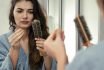 Woman Losing Hair On Hairbrush In Hand