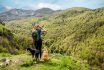 Young Woman In Sportswear Doing A Breack During A Hike Near Holzarté In The French Basque Country