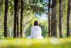 Woman Relaxingly Practicing Meditation In The Pine Forest To Attain Happiness From Inner Peace Wisdom With Beam Of Sun Light For Healthy Mind And Soul Concept For Healthy Mind And Soul