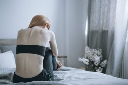 Woman With Anorexia On Bed