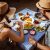 Young Tourists Couple Eating Traditional Greek Food At Rustic Restaurant