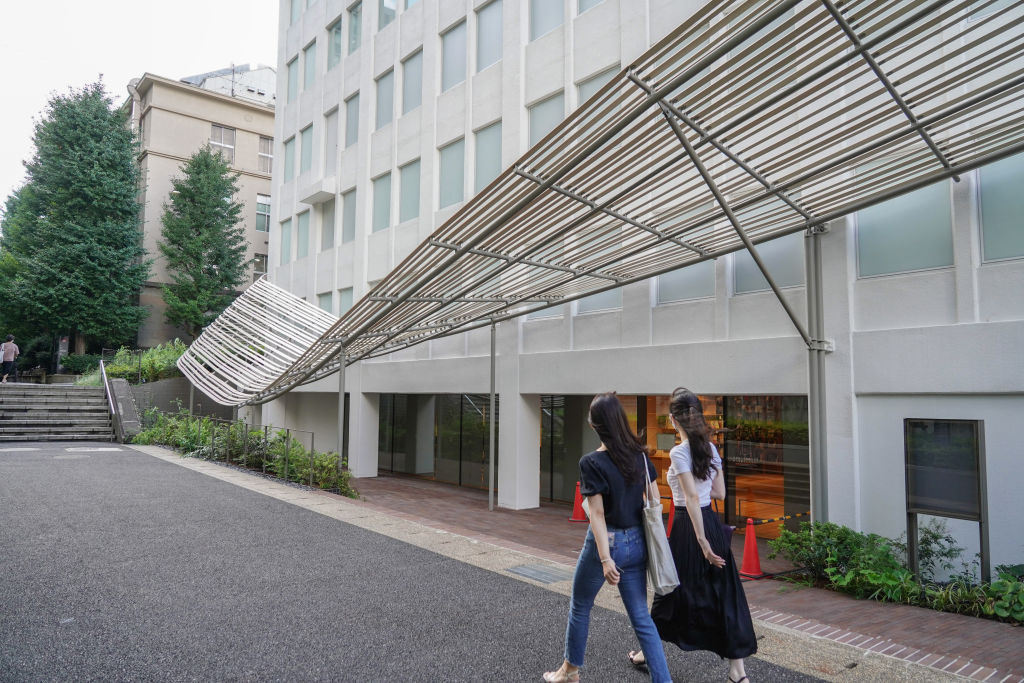 Students Walk Past The Haruki Murakami Library In Waseda