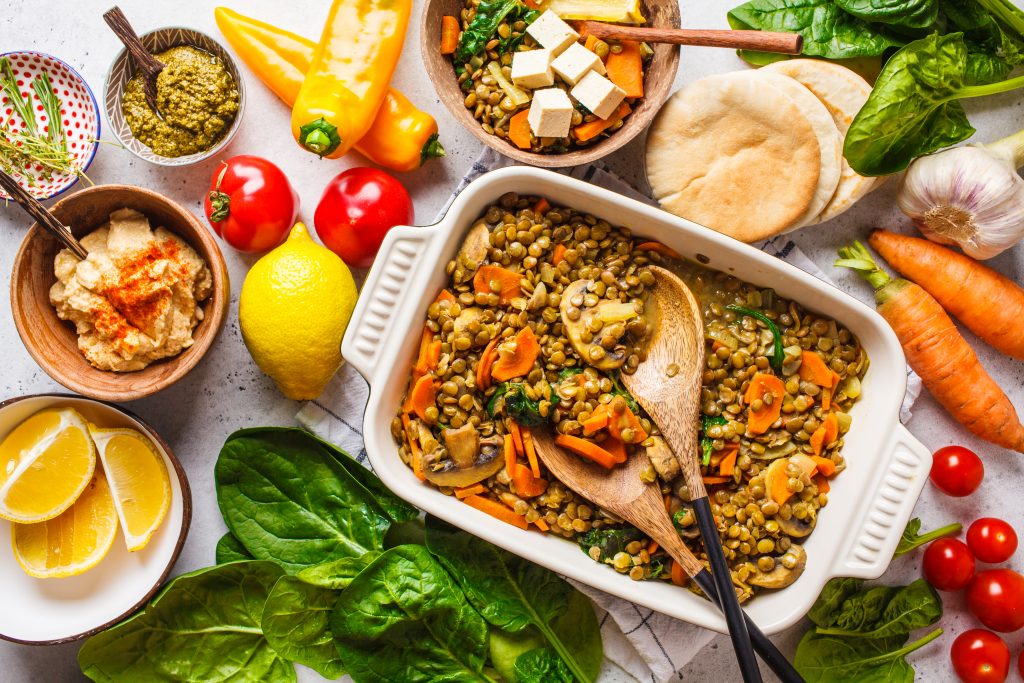 Vegan Lentil Curry With Vegetables, Top View. Healthy Plant Based Food Background.