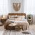 Rustic Home Design With Ethnic Boho Decoration. Bed With Pillows, Wooden Furniture