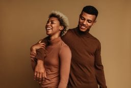 Smiling African American Man And Woman Standing Together