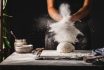 Female Hands Preparing Sourdough Bread In Kitchen