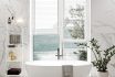 White And Light Marble Bathroom Interior With Bathtub, Window, And Shelf With Bath Accessories, 3d Rendering