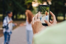 Social Media User Boy Recording A Video With His Friends To Flaunt Her Lifestyle. Young Influencer Blogger Teen Girls. Vlog Live Talk Share Chat On Social Media App.