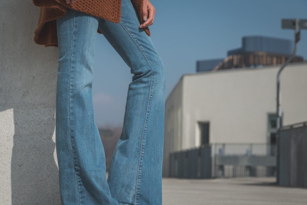 Close Up A Woman's Legs Posing In Jeans In The City