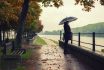 Woman Standing On The Rain