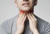 Young Man Pulping His Inflamed Neck, Close Up