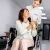 Friendly Nurse Assisting Disabled Woman Stock Photo