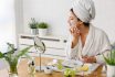 Young Woman Applying Face Mask At Home. Natural Skin Care Routine For Glowing Skin.