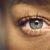 Macro Studio Shot Of Woman's Eye With Close Up On Eyelashes And Pupil