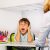 Boy Screaming While Sitting At Classroom