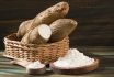 Raw Cassava Starch Manihot Esculenta. Wooden Background